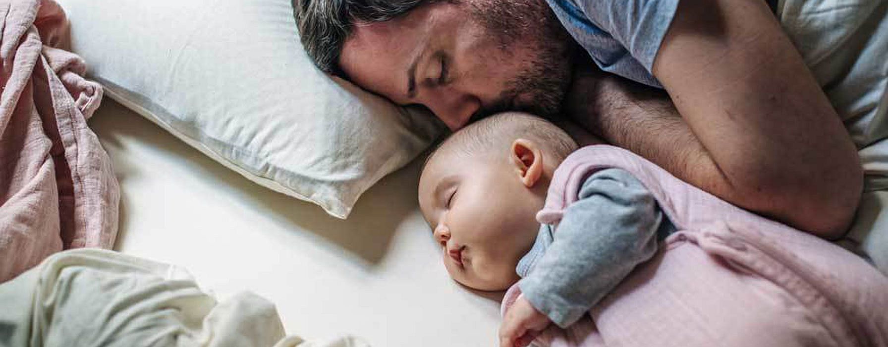 parents and baby are sleeping