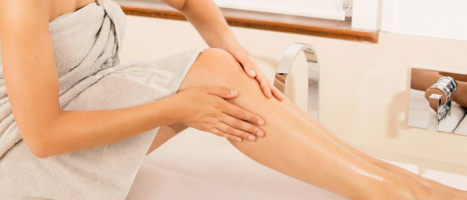 Beinmassage mit Öl