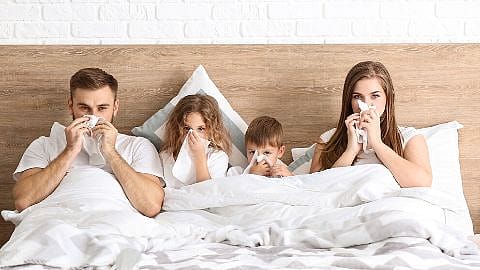 familie im bett